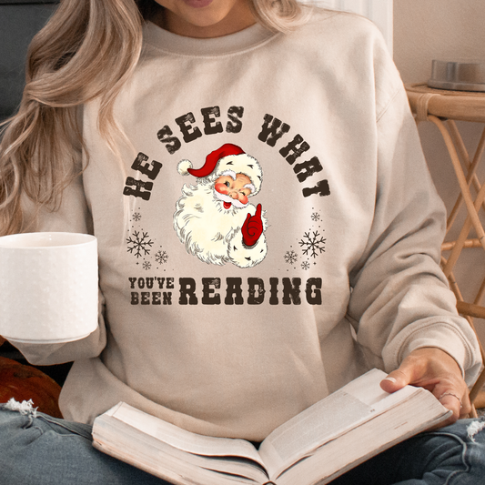 He Sees What You've Been Reading Santa Sweatshirt Christmas Sweater